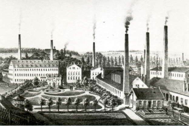Schwarze und weiße Zeichnung einer Fabrik mit rauchenden Schornsteinen, umgeben von Gebäuden, Grünflächen und einem Zaun, mit dem Text "New York State Penitentiary" unten.