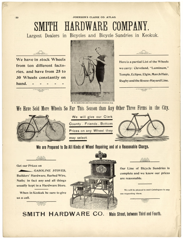 Werbung für Smith Hardware Co. mit einer Person, die ein Fahrrad hält und ein Rad deutlich im Vordergrund sowie Text, der die Produkte und Dienstleistungen des Unternehmens beschreibt.