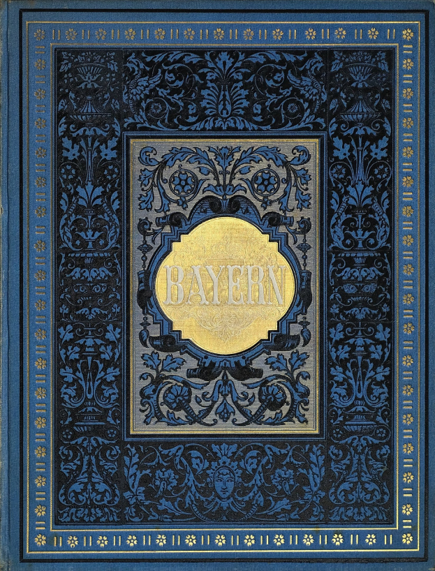 Ein blau-goldenes Buch mit der Aufschrift 'Bayern', das mit detaillierten Verzierungen geschmückt ist.