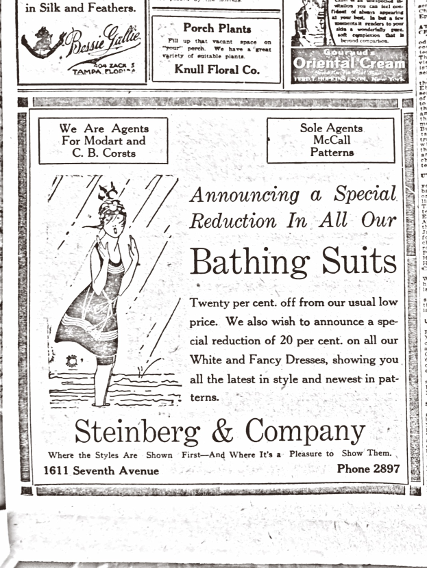 Eine Frau in einem weißen hochgeschlossenen, langärmeligen Kleid mit einem Dutt, die zentral in einer Werbung für Steinberg & Company's Badesachen steht, umgeben von Text.